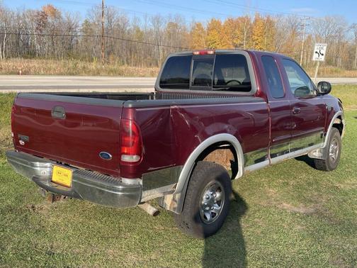Red 1999 Ford F-250 XL SuperCab