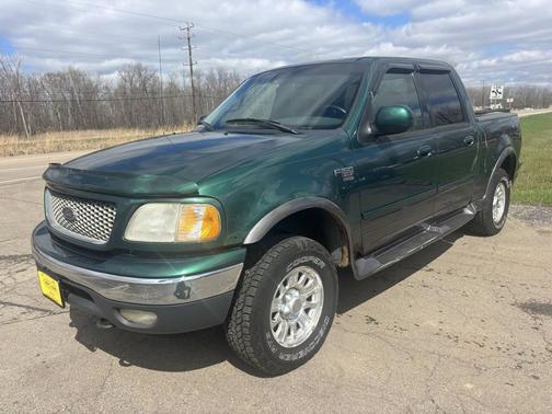 Green 2001 Ford F-150 XLT SuperCrew Truck