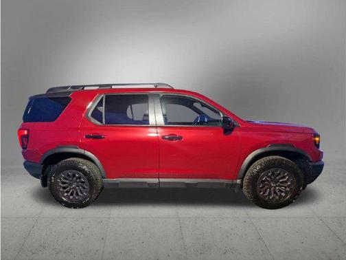 Red 2026 Honda Passport AWD TrailSport