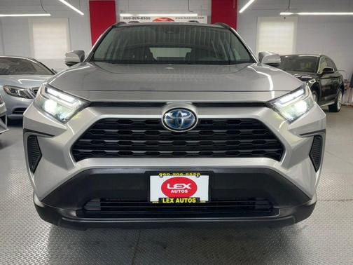 Silver Sky Metallic 2023 Toyota RAV4 Hybrid LE