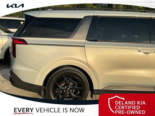 Ivory Silver 2025 Kia Carnival SX Prestige