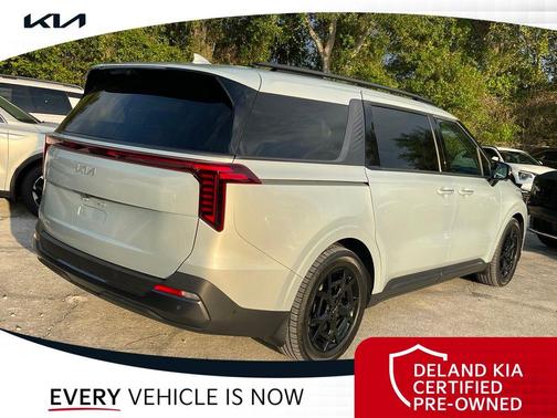 Ivory Silver 2025 Kia Carnival SX Prestige