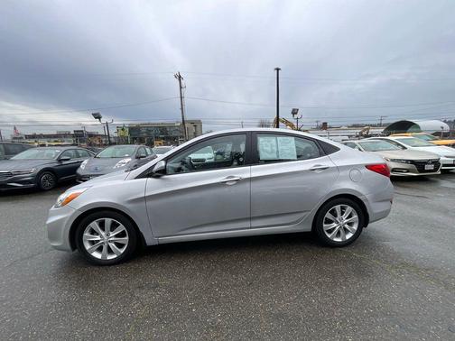 Ironman Silver Metallic 2014 Hyundai Accent GLS