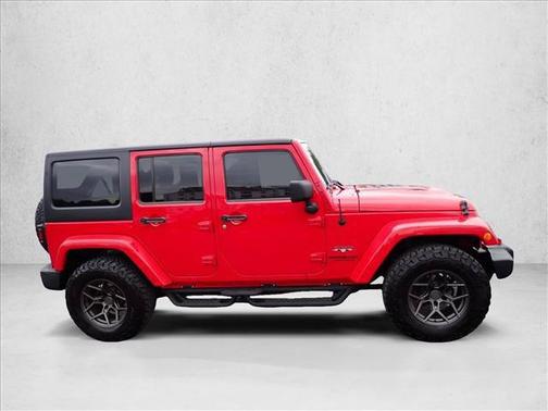 Flame Red 2013 Jeep Wrangler Unlimited Sahara