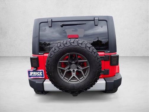 Flame Red 2013 Jeep Wrangler Unlimited Sahara