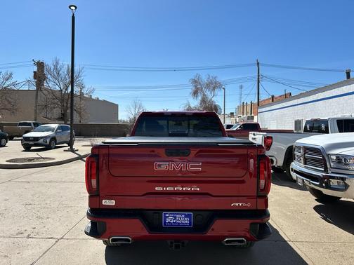 Volcanic Red Tintcoat 2024 GMC Sierra 1500 AT4