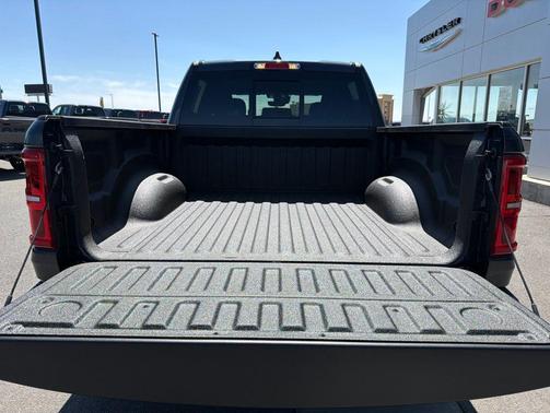Forged Blue Metallic 2026 RAM 1500 RHO Crew Cab 4x4 5'7' Box