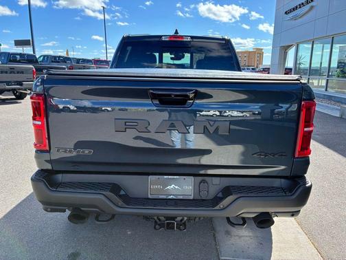 Forged Blue Metallic 2026 RAM 1500 RHO Crew Cab 4x4 5'7' Box