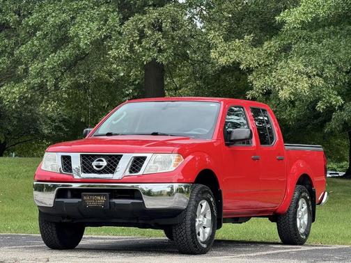 Red 2011 Nissan Frontier SV