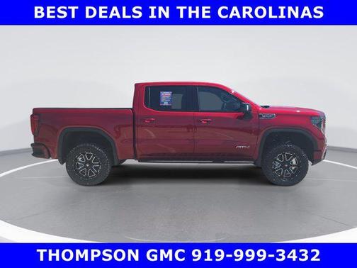 Volcanic Red Tintcoat 2026 GMC Sierra 1500 AT4
