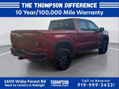 Volcanic Red Tintcoat 2026 GMC Sierra 1500 AT4