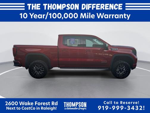 Volcanic Red Tintcoat 2026 GMC Sierra 1500 AT4