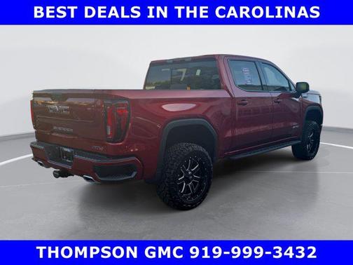 Volcanic Red Tintcoat 2026 GMC Sierra 1500 AT4