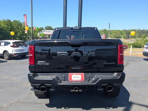 Diamond Black Crystal Pearlcoat 2025 RAM 1500 RHO Crew Cab 4x4 5'7' Box