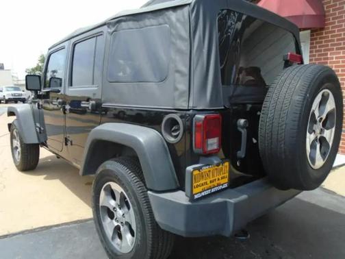 Black 2014 Jeep Wrangler Unlimited Sport