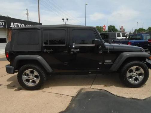 Black 2014 Jeep Wrangler Unlimited Sport