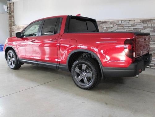 Red 2026 Honda Ridgeline TrailSport