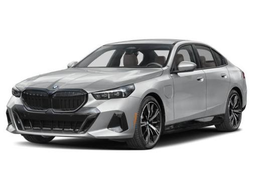 Vegas Red Metallic 2026 BMW 550e xDrive Sedan