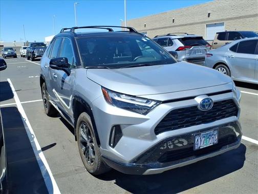Silver Sky Metallic/Midnight Black Metallic 2024 Toyota RAV4 Hybrid SE