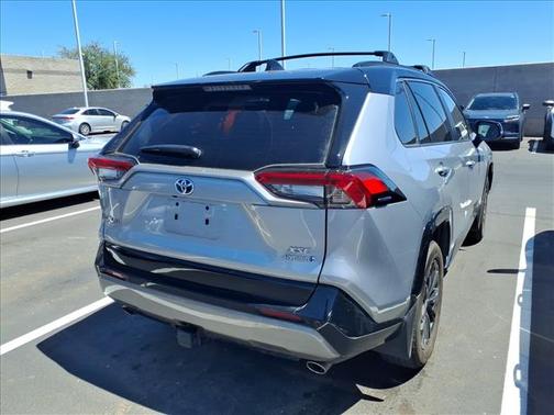 Silver Sky Metallic/Midnight Black Metallic 2024 Toyota RAV4 Hybrid SE