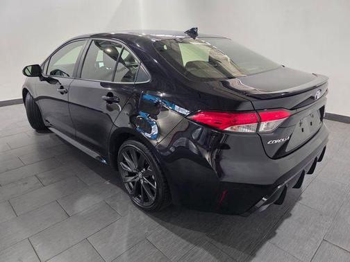 Midnight Black Metallic 2024 Toyota Corolla Hybrid SE