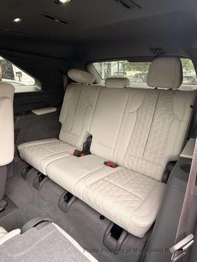Black Cherry Tintcoat 2025 Cadillac Escalade IQ Luxury 1