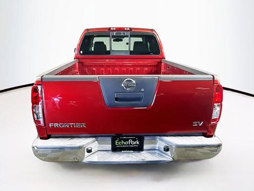 Red 2012 Nissan Frontier SV