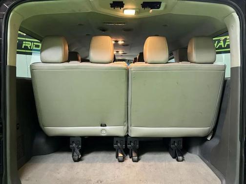 Red 2014 Nissan NV Passenger NV3500 HD SL V8