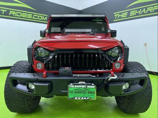 Red 2014 Jeep Wrangler Unlimited Rubicon