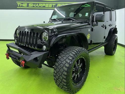 Black 2014 Jeep Wrangler Unlimited Sport