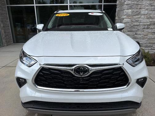 Red 2026 Toyota Highlander Hybrid Platinum