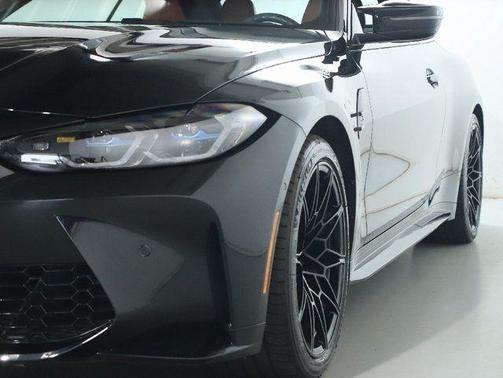 Black Sapphire Metallic 2024 BMW M4 Competition xDrive