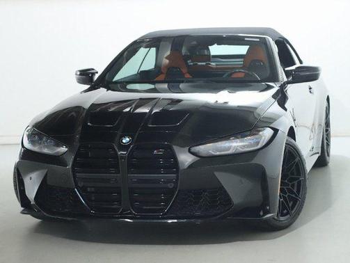 Black Sapphire Metallic 2024 BMW M4 Competition xDrive