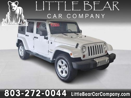 White 2013 Jeep Wrangler Unlimited Sahara