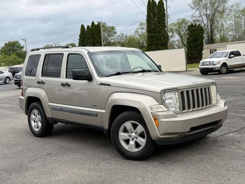 Gold 2010 Jeep Liberty Sport