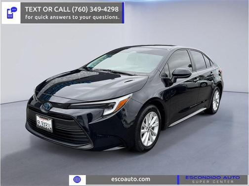 Midnight Black Metallic 2024 Toyota Corolla Hybrid LE