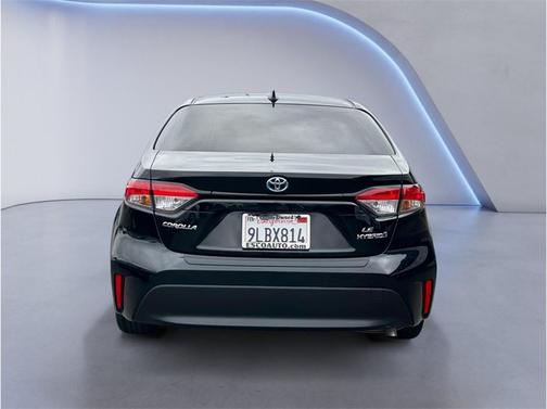 Midnight Black Metallic 2024 Toyota Corolla Hybrid LE