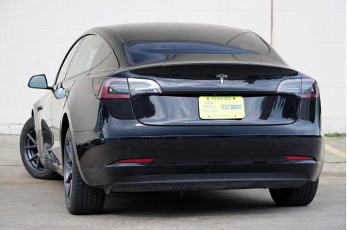 Solid Black 2021 Tesla Model 3 Standard Range Plus