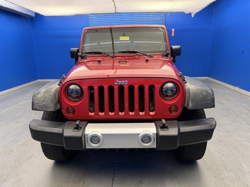 Flame Red 2010 Jeep Wrangler Unlimited Sahara
