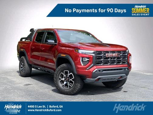 Volcanic Red Tintcoat 2025 GMC Canyon 4WD AT4