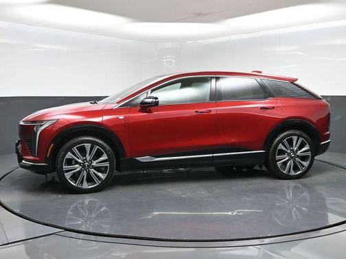 Radiant Red Tintcoat 2026 Cadillac OPTIQ Premium Luxury