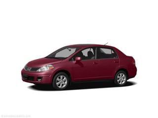 Red Brick 2010 Nissan Versa 1.8 S