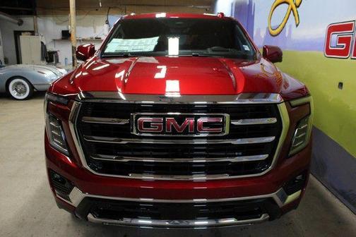Volcanic Red Tintcoat 2026 GMC Yukon 4WD Elevation
