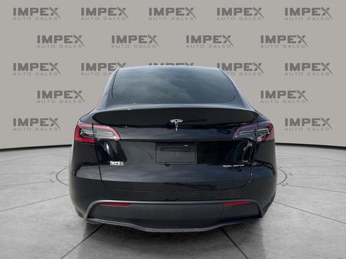 Solid Black 2025 Tesla Model Y Long Range Dual Motor All-Wheel Drive