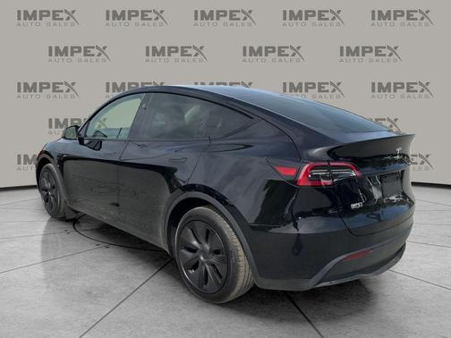Solid Black 2025 Tesla Model Y Long Range Dual Motor All-Wheel Drive