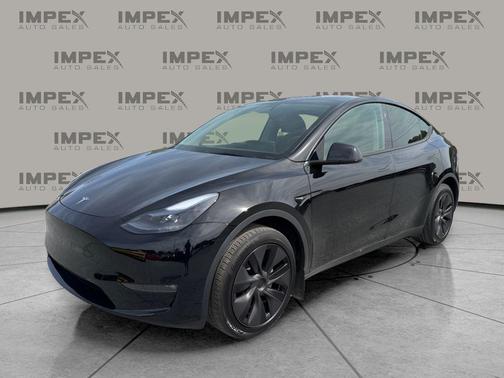 Solid Black 2025 Tesla Model Y Long Range Dual Motor All-Wheel Drive