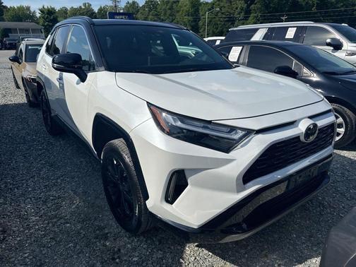 Wind Chill Pearl/Midnight Black Metallic 2025 Toyota RAV4 Hybrid SE