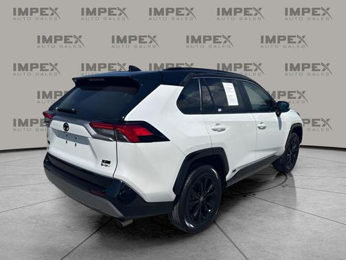 Wind Chill Pearl/Midnight Black Metallic 2025 Toyota RAV4 Hybrid SE