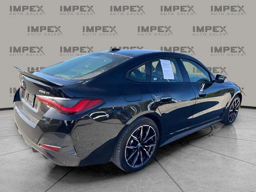Black Sapphire Metallic 2024 BMW i4 Gran Coupe eDrive40