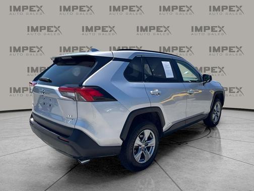 Silver Sky Metallic 2023 Toyota RAV4 Hybrid LE